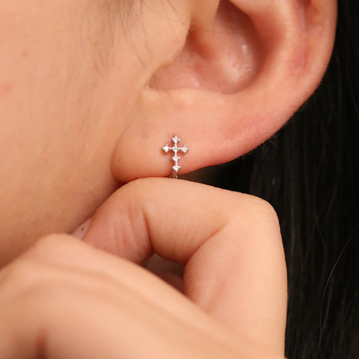 Cubic cross huggie earring - Image 5